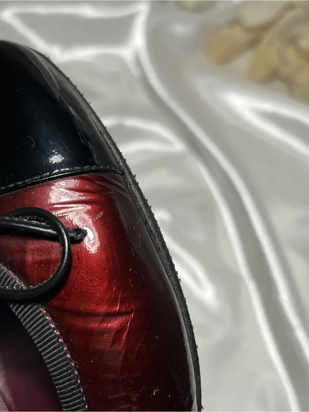 CHANEL Two-Tone Burgundy and Black Cap-Toe Ballerinas
